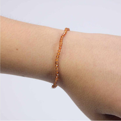 Pulseira de Bola Facetada 2mm Hessonite