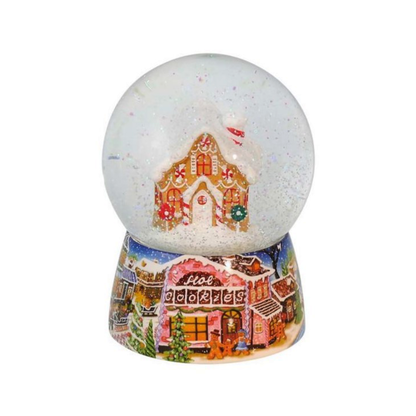 Bola de nieve con música de casa de pan de jengibre