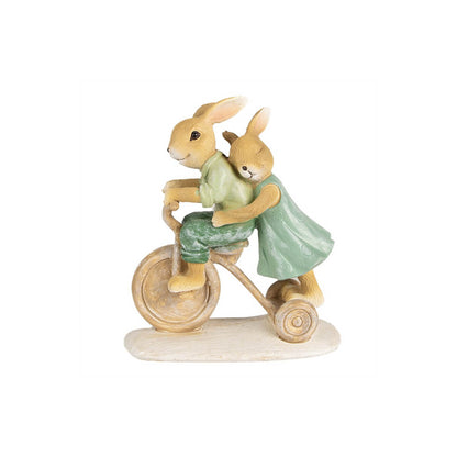 Figura Coelhos na Bicicleta