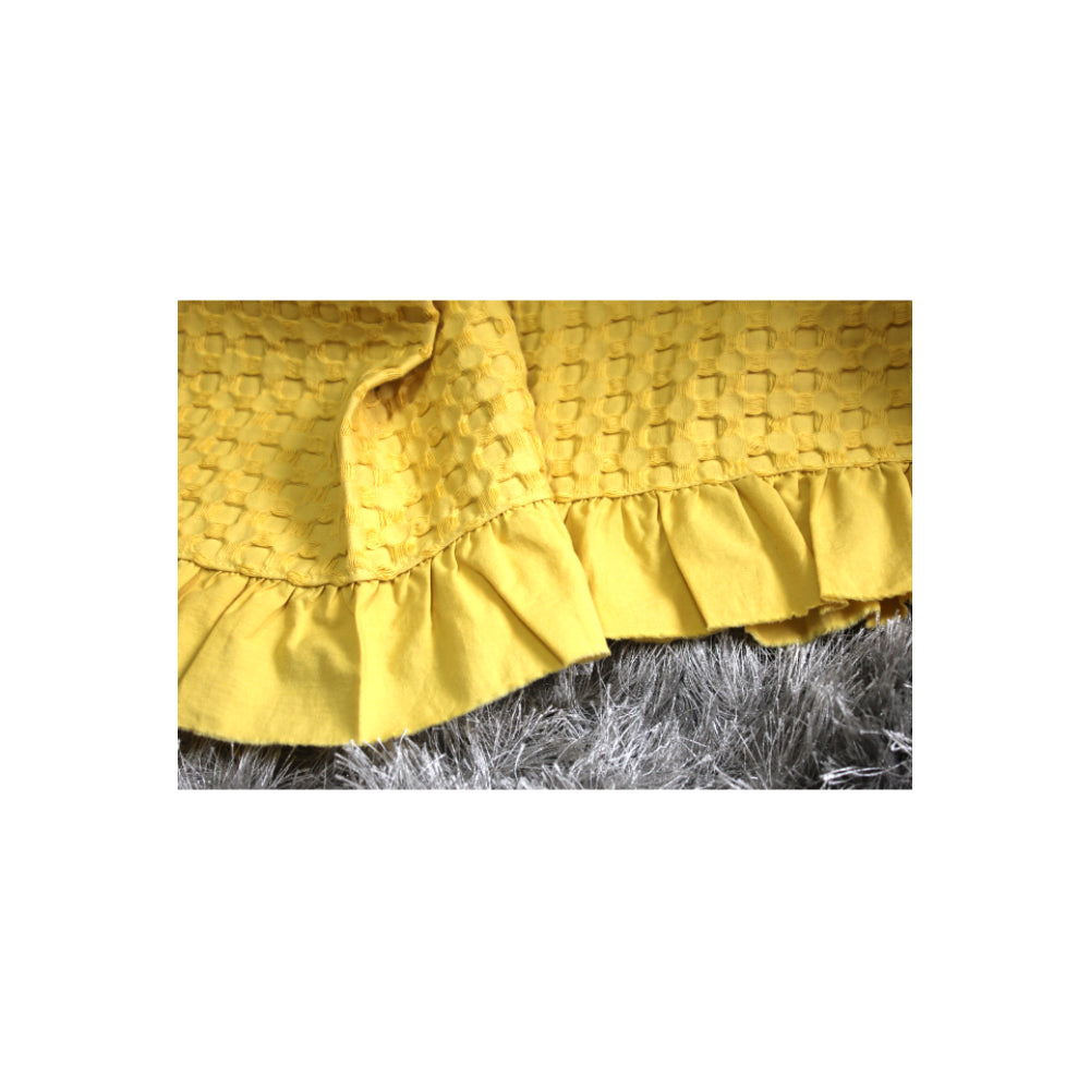 yellow bedspread